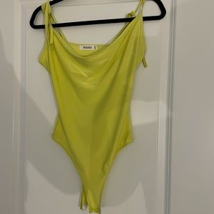 Neon yellow body suit